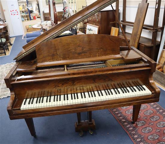 A Challen figured walnut baby grand piano